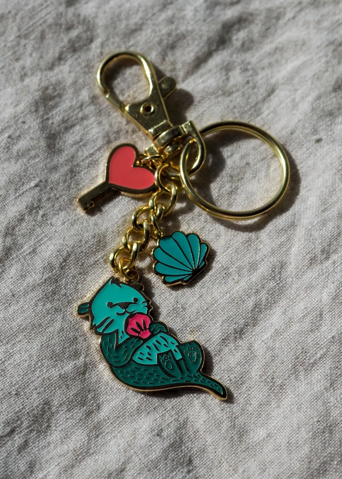 Sea Otter Enamel Keychain - Minty Green - Glow-in-the-Dark